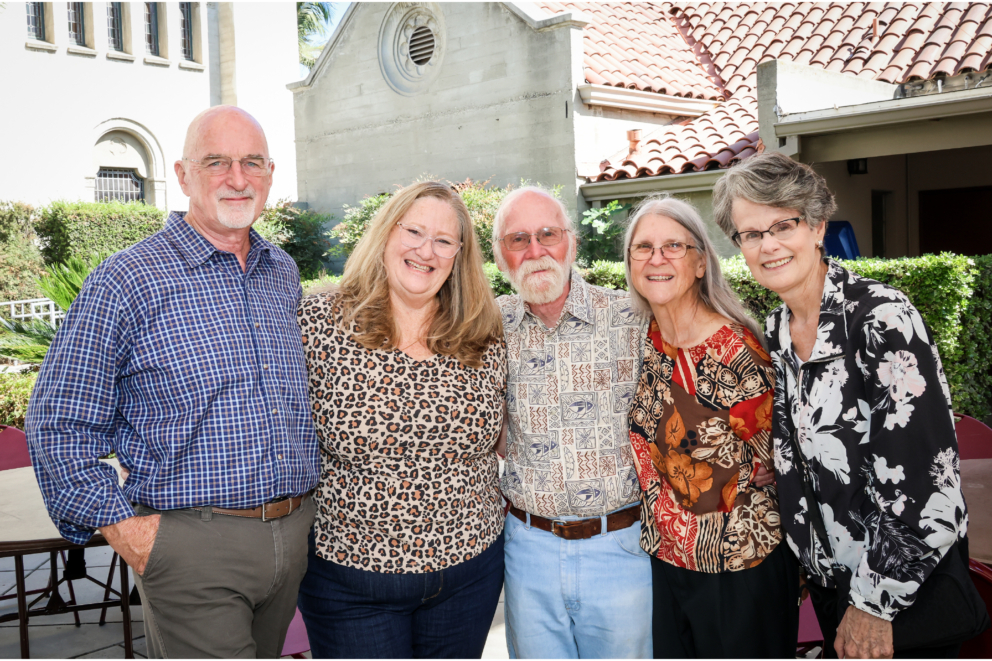 Guests smiling together at the Community Brunch at the Church of the Brethren.